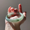 Floating green Burmese jadeite bangle with sa jin gold dust, 58.7mm, photo 1 - Luxe Jadeite