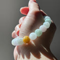 Carved lotus multi-colour Burmese jadeite bead bracelet, video 2, photo 1 - Luxe Jadeite