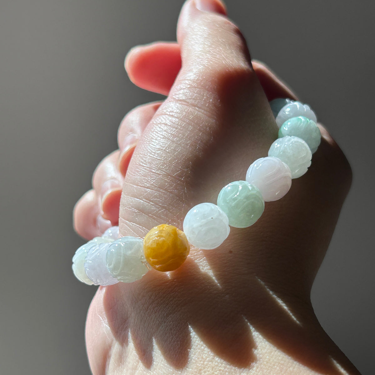 Carved lotus multi-colour Burmese jadeite bead bracelet, video 2, photo 1 - Luxe Jadeite
