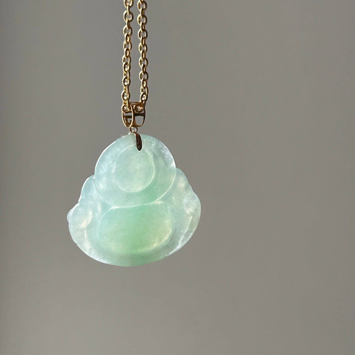 Apple Green Buddha Pendant - Lighter Colour on Model, photo 4 - Luxe Jadeite