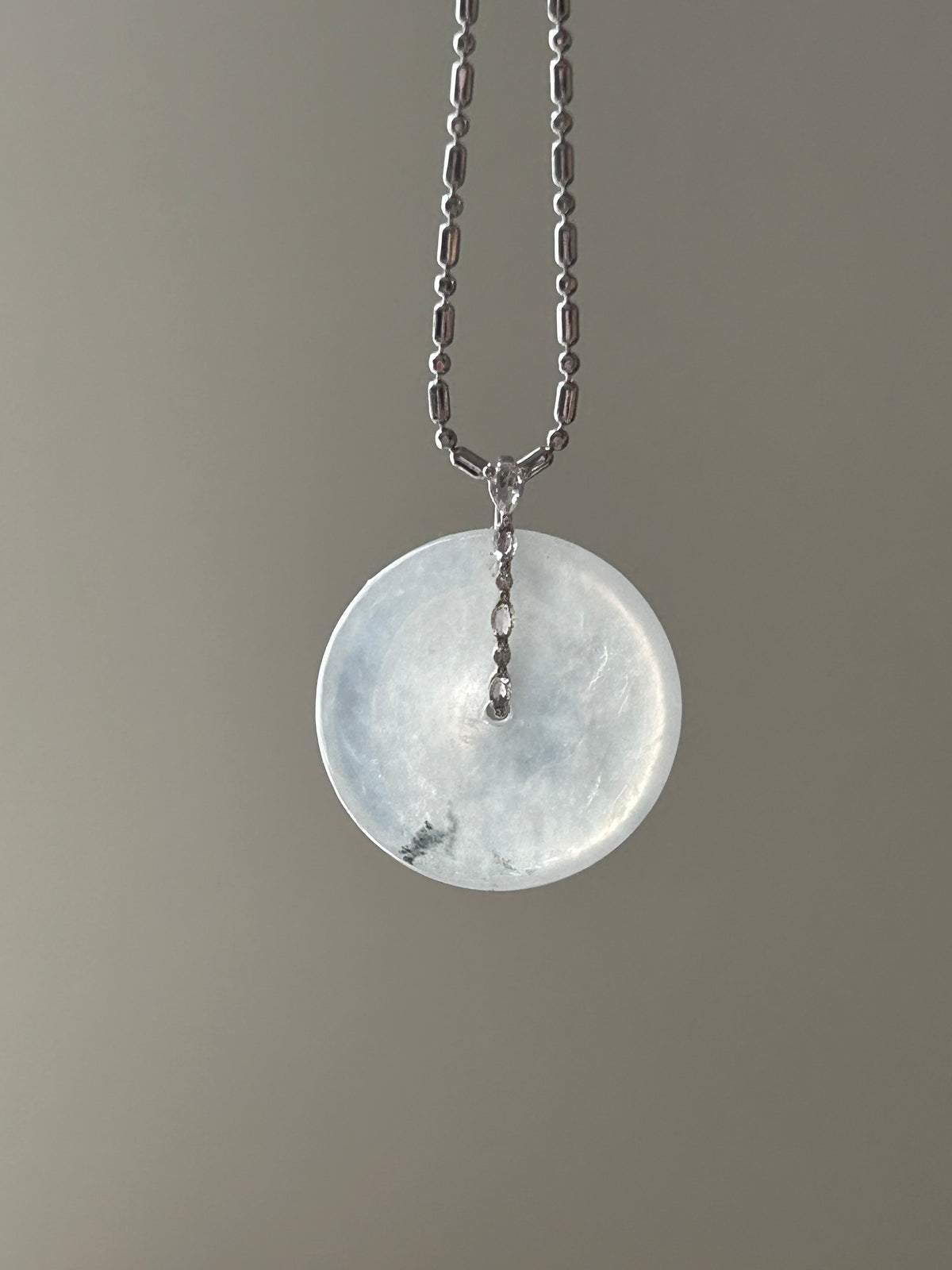 Icy white jadeite ping an kou pendant with floating wuji in 18k gold - Luxe Jadeite