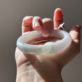 Icy lavender Burmese jadeite bangle with floating green, 57.6mm, photo 1 - Luxe Jadeite