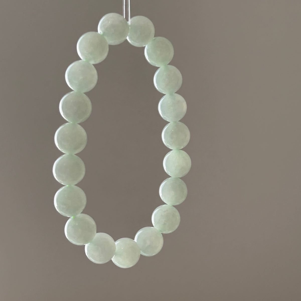 Light apple green jelly Burmese jadeite bead bracelet - Luxe Jadeite