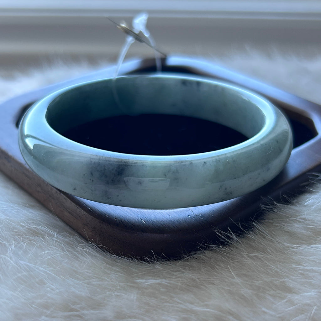 Floating green Burmese jadeite bangle with black chicken (wuji), 58.6mm - Luxe Jadeite