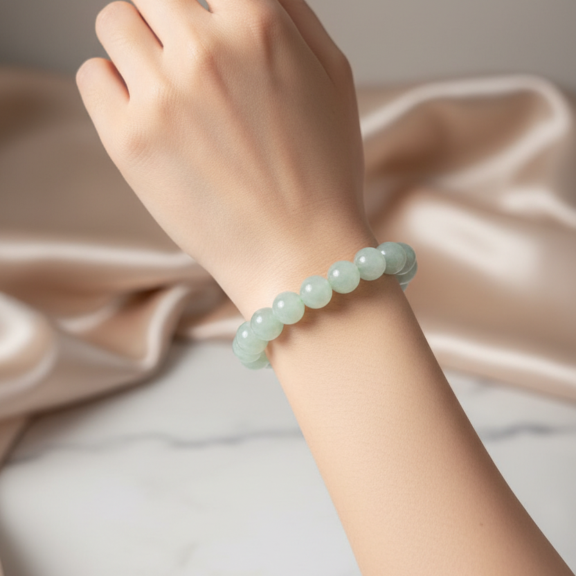 Light apple green jelly Burmese jadeite bead bracelet - Luxe Jadeite