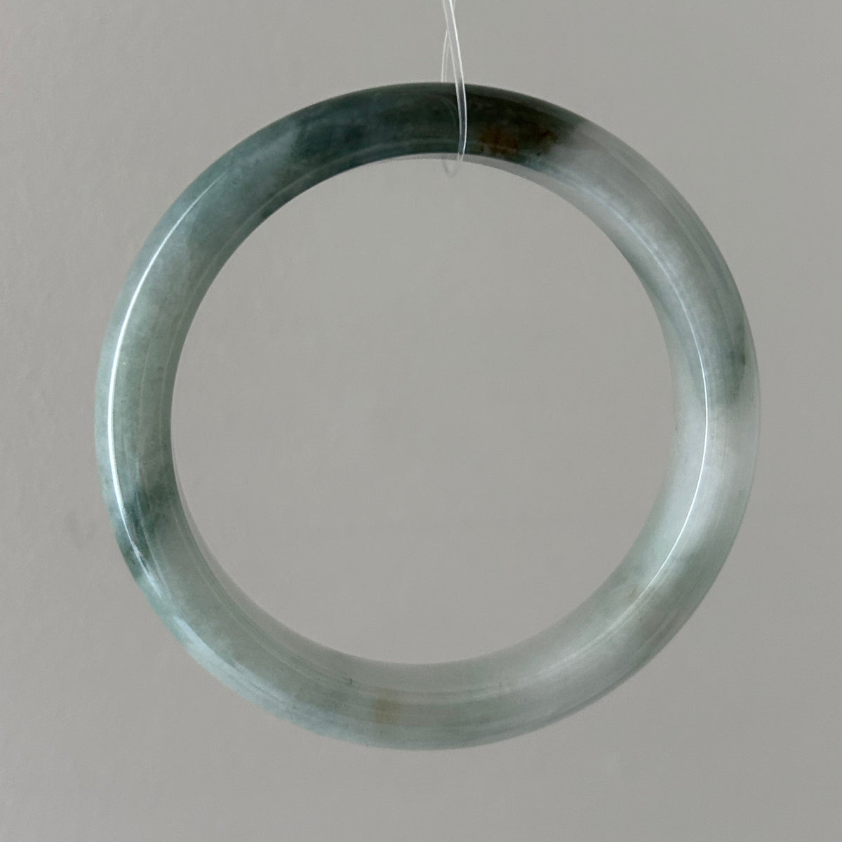 Floating green Burmese jadeite bangle with sa jin gold dust, 58.7mm - Luxe Jadeite