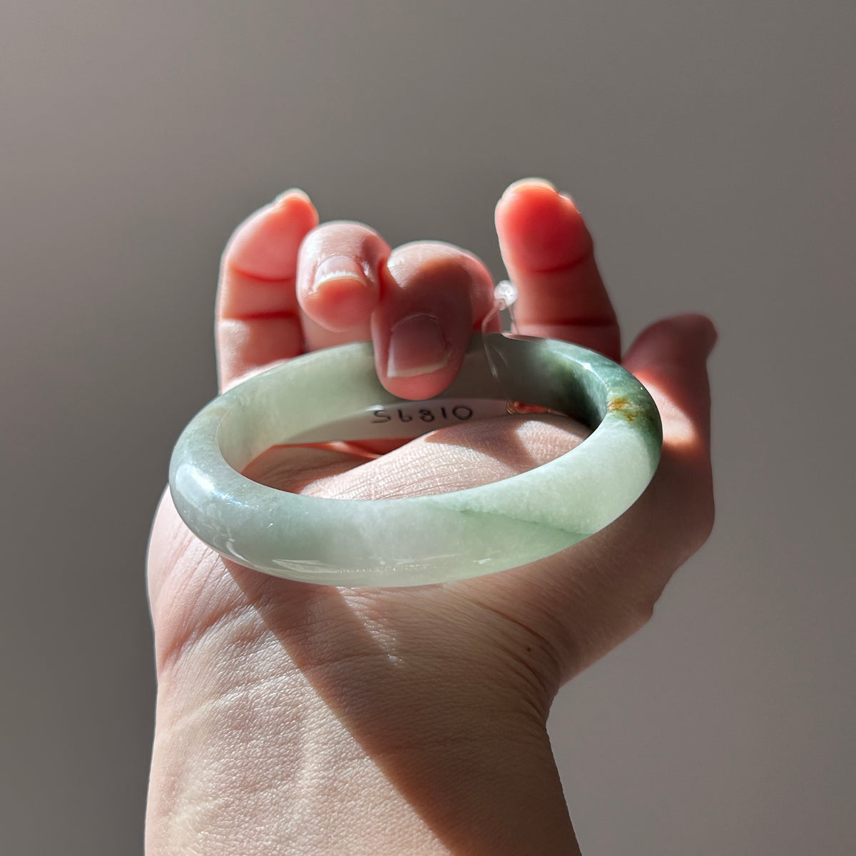 Floating green Burmese jadeite bangle with sa jin gold dust, 58.7mm, photo 3 - Luxe Jadeite