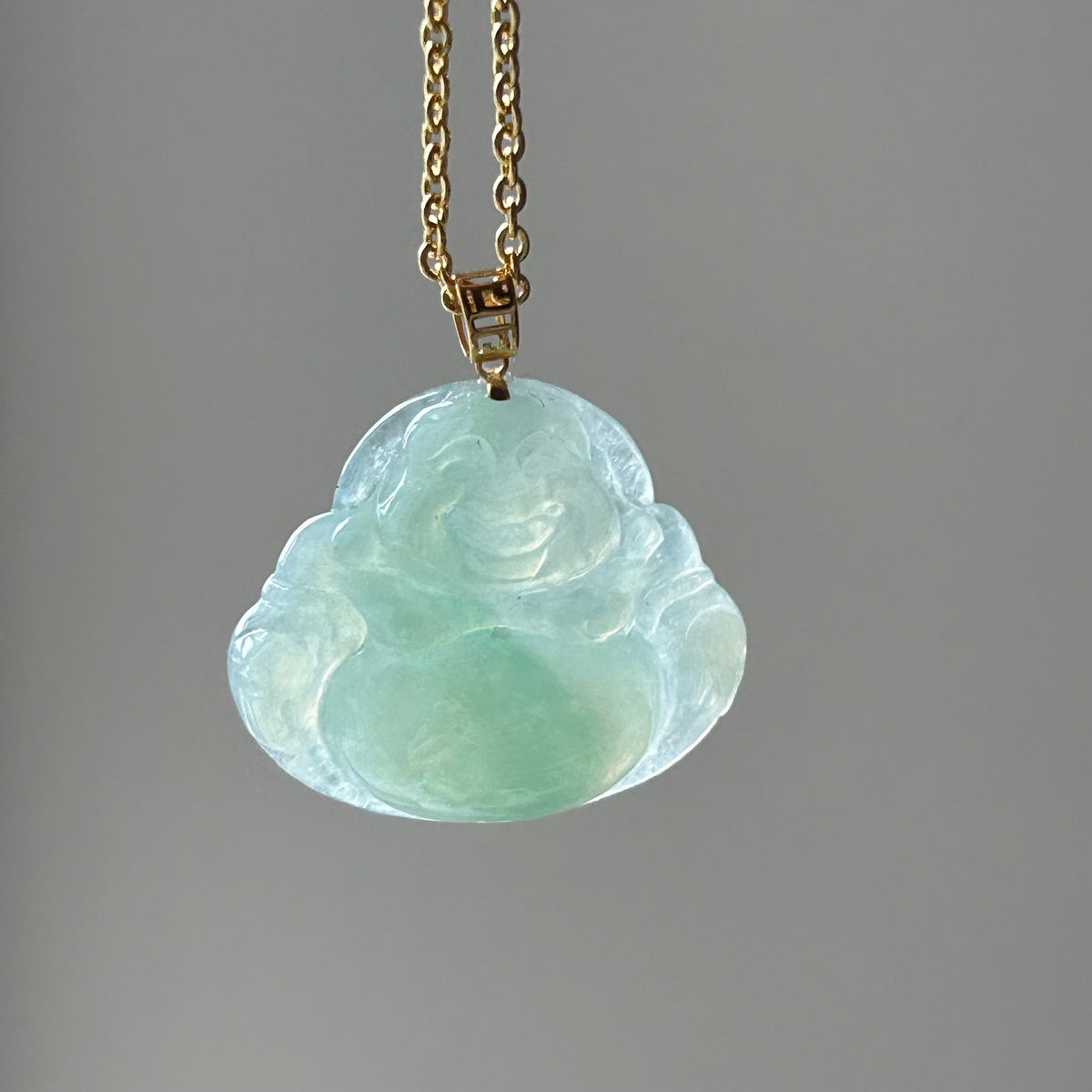 Apple Green Buddha Pendant - Lighter Colour on Model, photo 3 - Luxe Jadeite