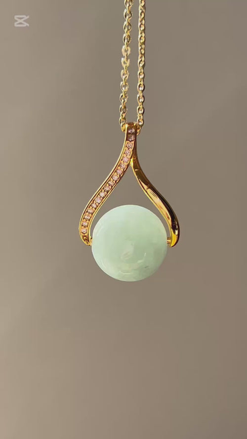 Apple green Burmese jadeite bead pendant in gold-plated sterling silver, video 2 - Luxe Jadeite